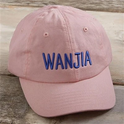 Saumað baseballhettu